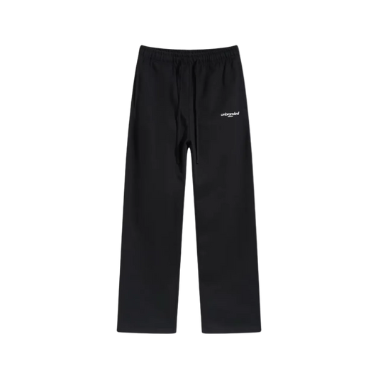 Black wide-leg sweatpants with an elastic waistband and a small white 'uniquely' logo on the left thigh, shown against a plain white background.